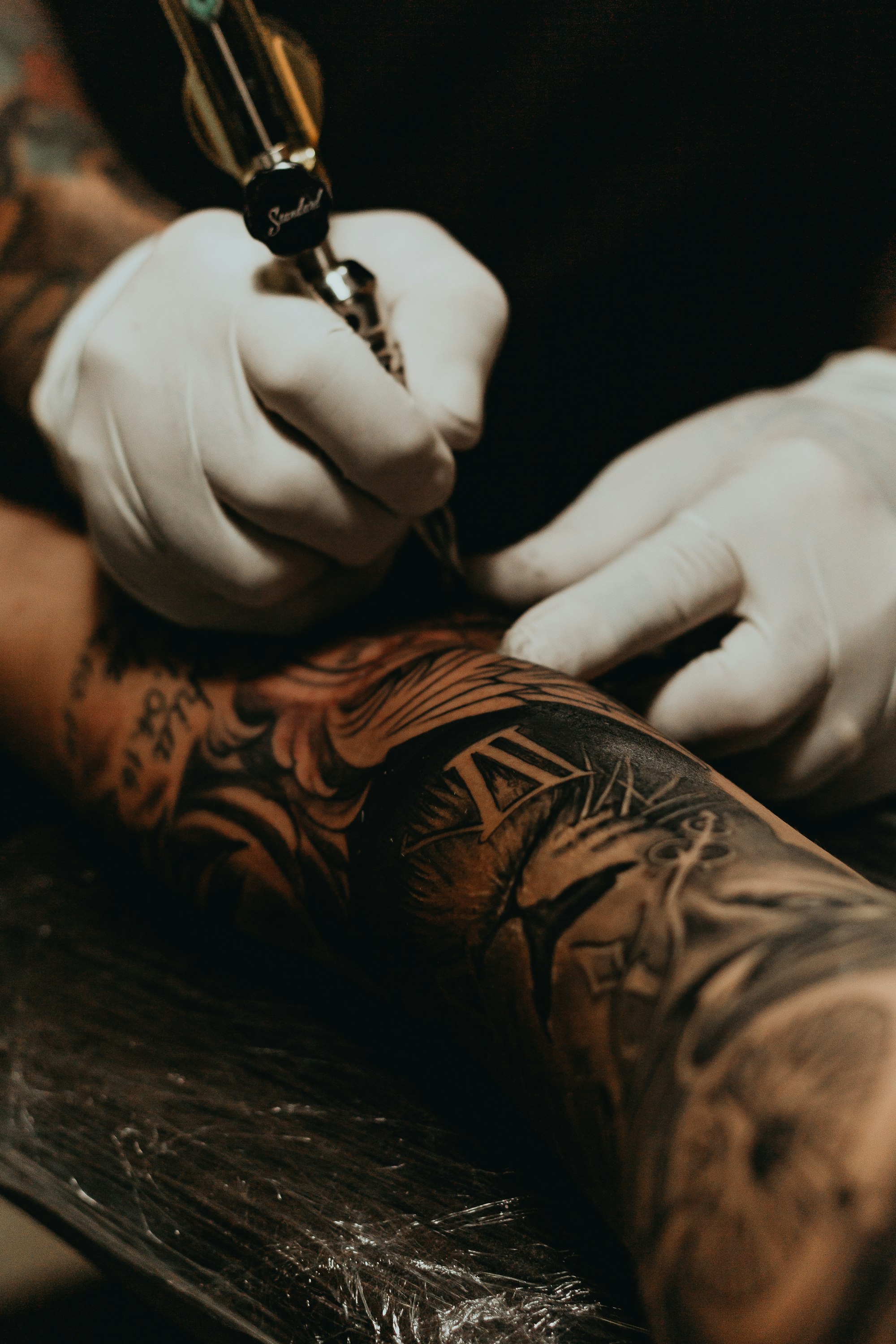 Tattoo artist at work
